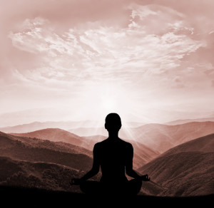Yoga practicioner during the sunset meditation